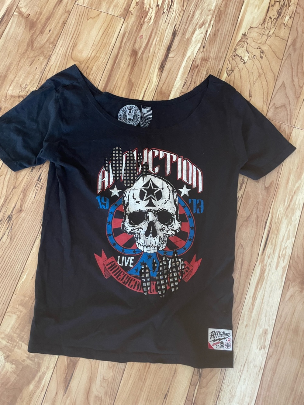 Affliction Black Skull Graphic Women’s Tee with Red & Blue Accents
